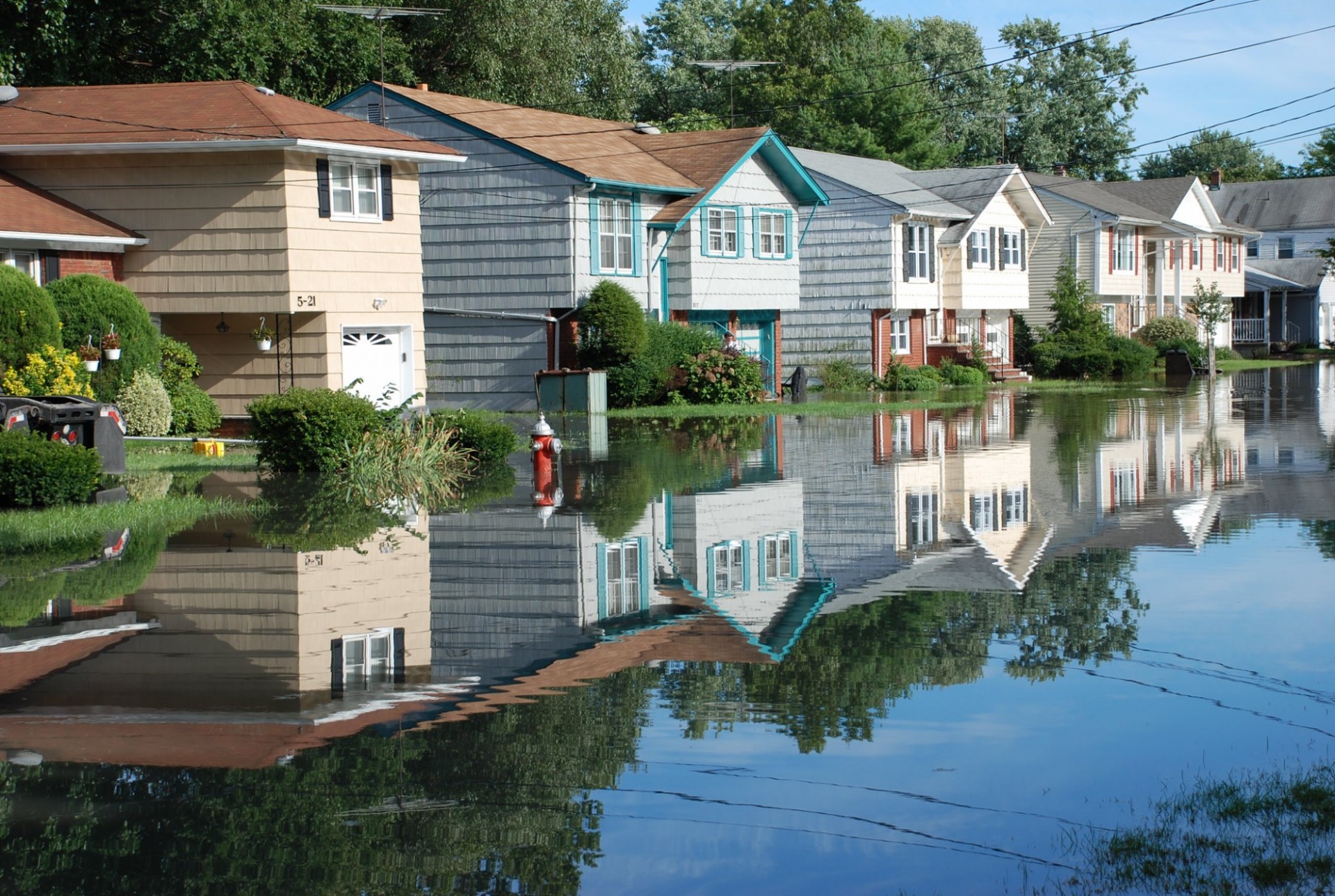 Homes along a flooded street